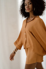 Model wearing Jenn Lee Jamu Short Sleeve Shirt and Jenn Lee Jamu Shorts