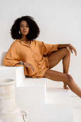 Model wearing Jenn Lee Jamu Short Sleeve Shirt and Jenn Lee Jamu Shorts