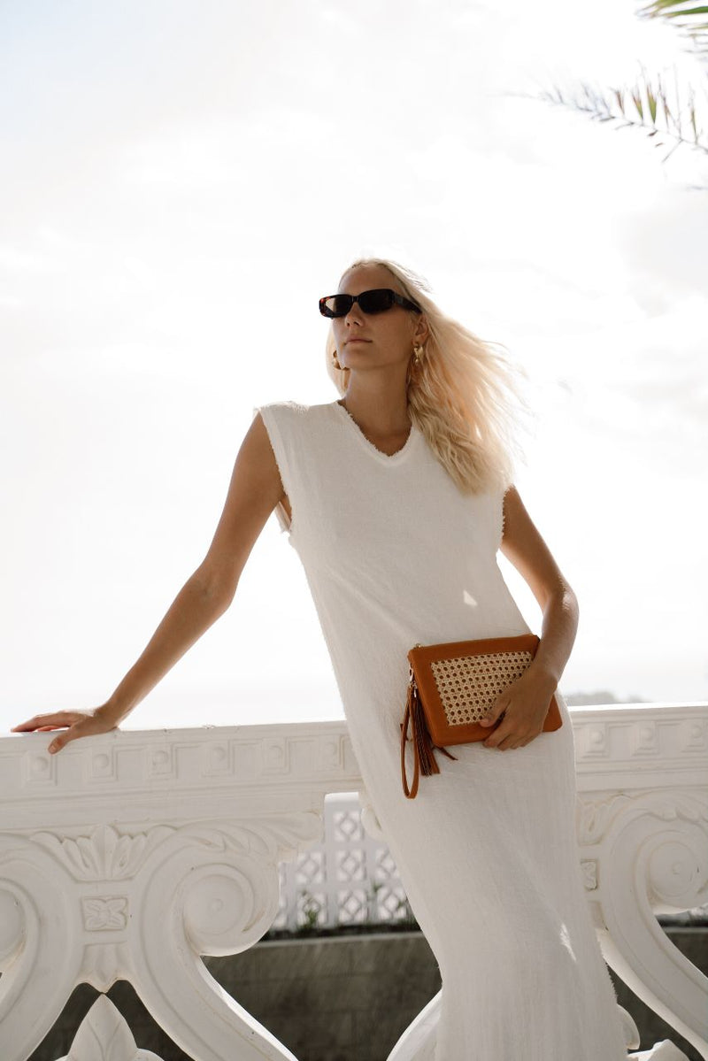 Model wearing Jenn Lee Siena 3-in-1 as clutch