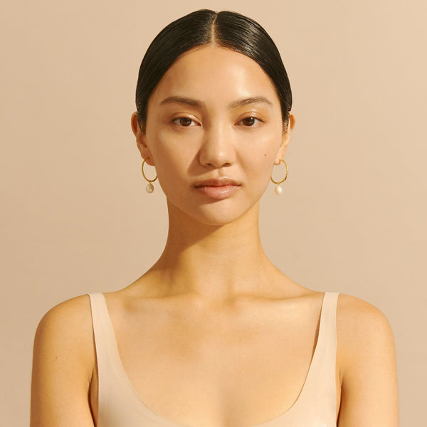 Model wearing Amber Sceats Liliana Earrings